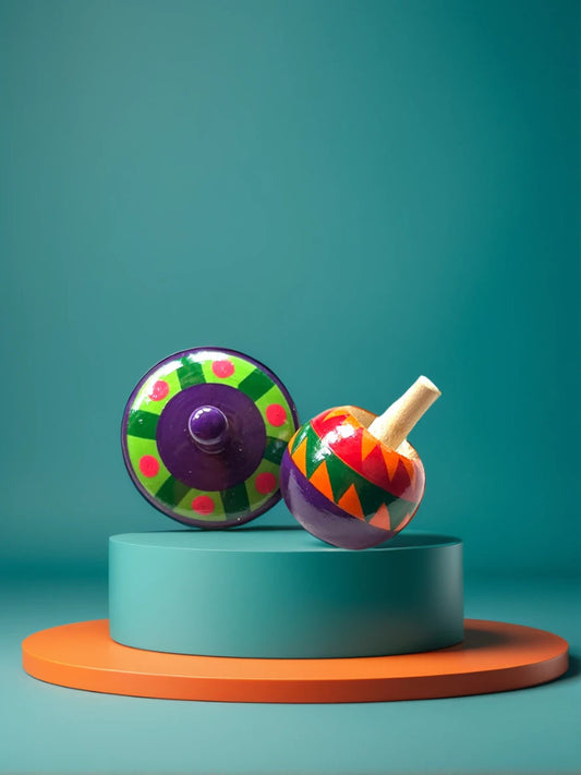 Colorful toy top and wooden top on a green platform with a teal background