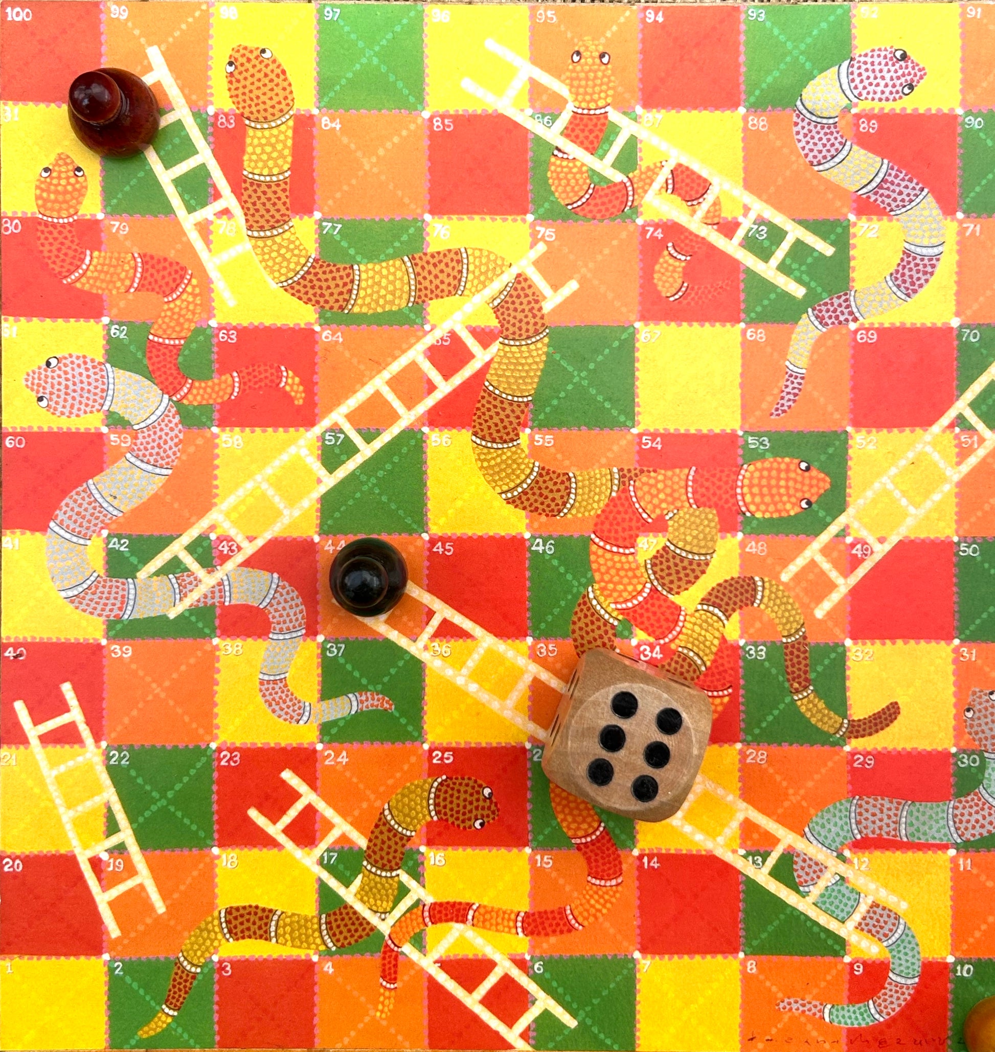 Colorful snakes and ladders board game
