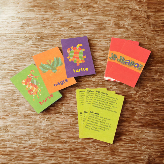Colorful card game on a wooden surface