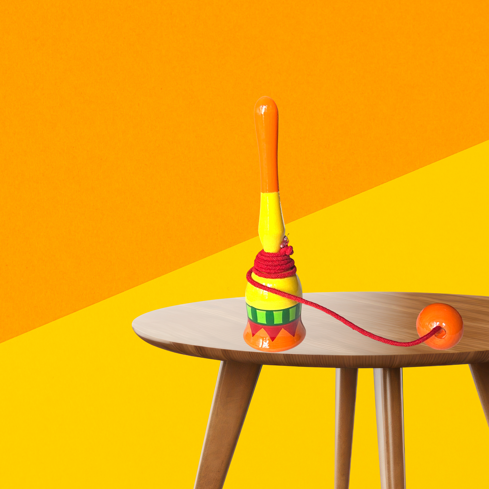 Colorful toy on a wooden stand with a bright orange background